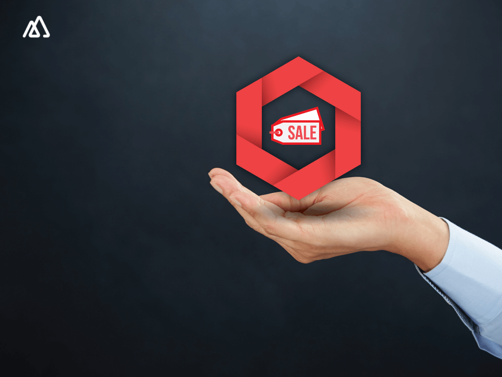 man holding a sales icon on his palm